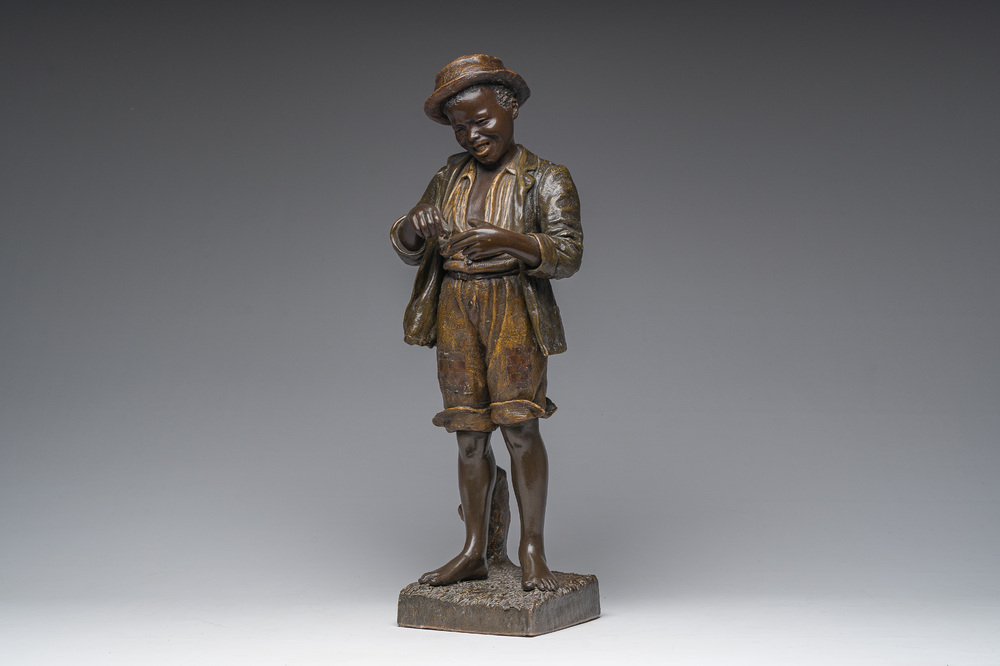 Cherc for Goldscheider (Hans Sch&ouml;rk (1849-1899), after): A polychrome decorated terracotta figure of a youth, Goldscheider mark, 20th C.