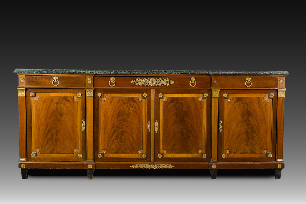 An imposing French Empire style gilt bronze mounted cherrywood dresser with a green marble top, 20th C.