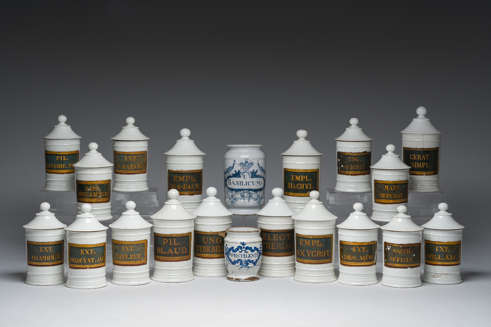 Two Dutch Delft blue and white and eighteen gilt and polychrome decorated porcelain pharmacy jars, 18th/19th C.