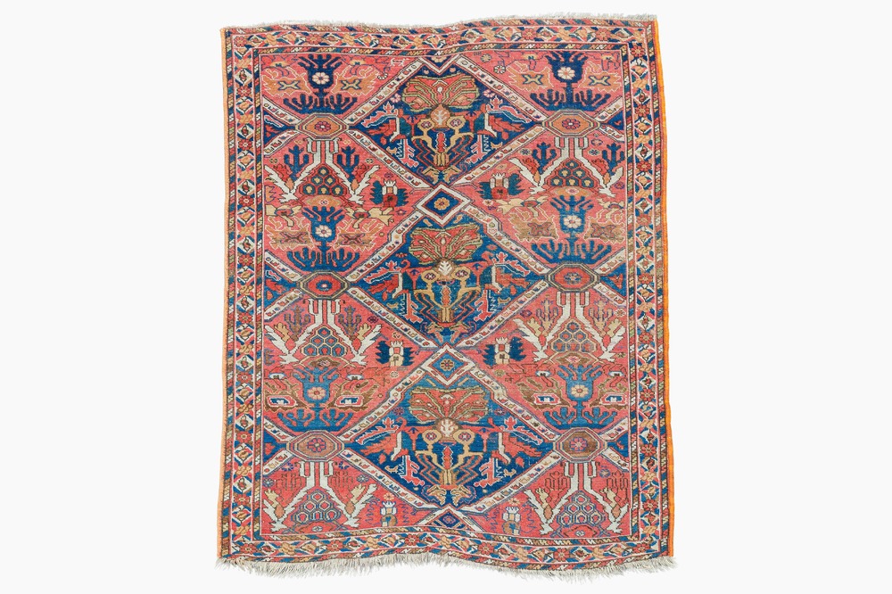 An Azerbaijani rug with geometric design, wool on cotton, 20th C.
