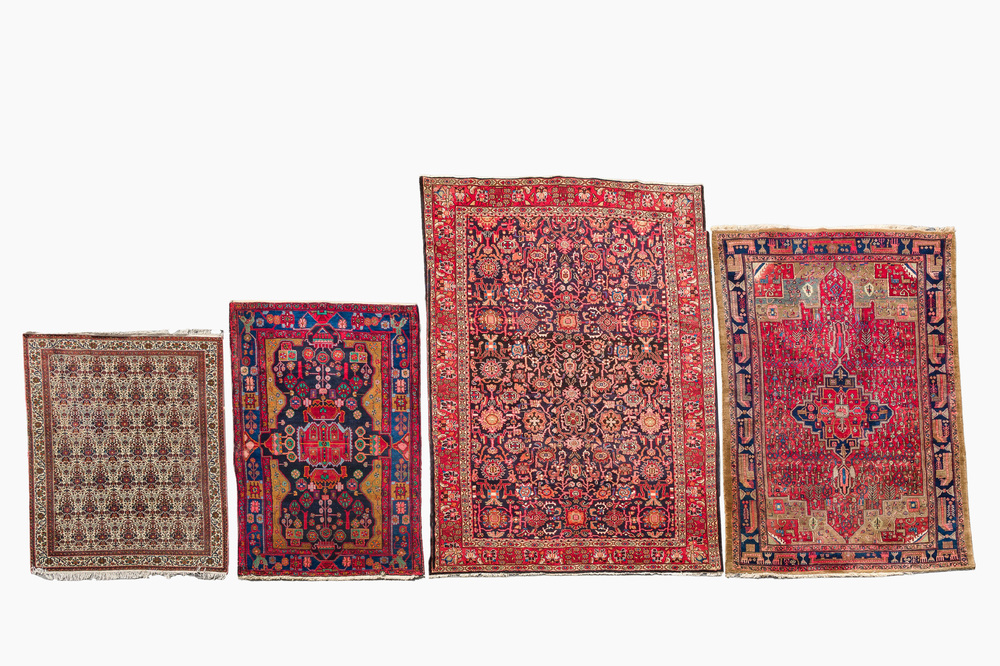 Four oriental rugs, a.o. Tabriz, Sarouk and Hamadan/Nahavand rugs with floral and geometric design, wool and cotton, 20th C.