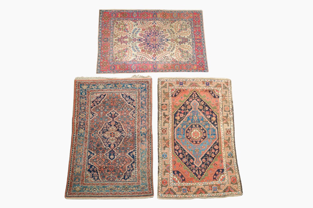 Three oriental rugs with floral design, Tabriz, Sarouk and Hamadan, wool on cotton, 20th C.