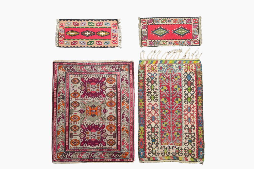 Four oriental carpets, a.o. three Turkish Kelim (Kilim) rugs with geometric design, wool on cotton, 20th C.