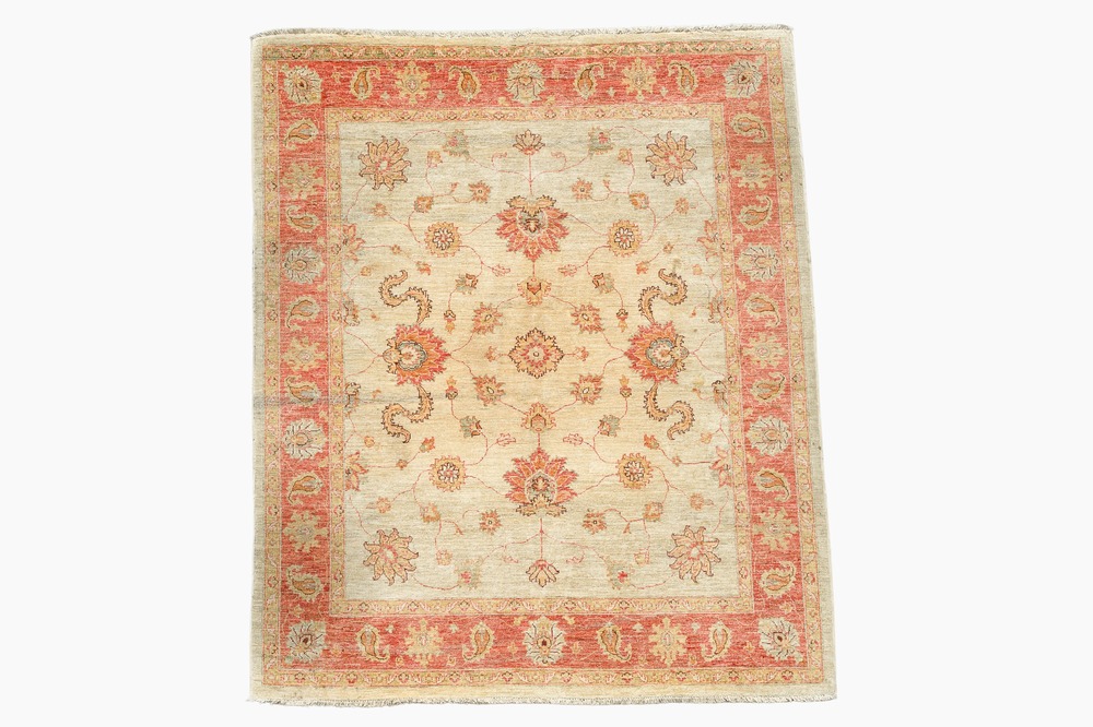 An Afghan Ziegler rug with floral design, wool on cotton, 20th C.