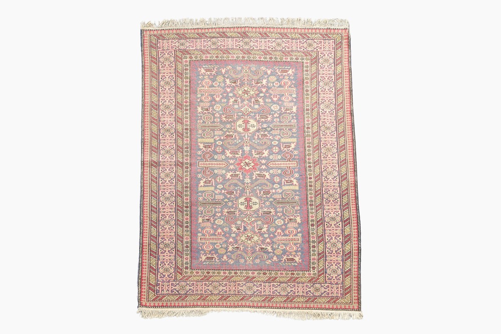 A Caucasian rug with geometric design, wool on cotton, 20th C.
