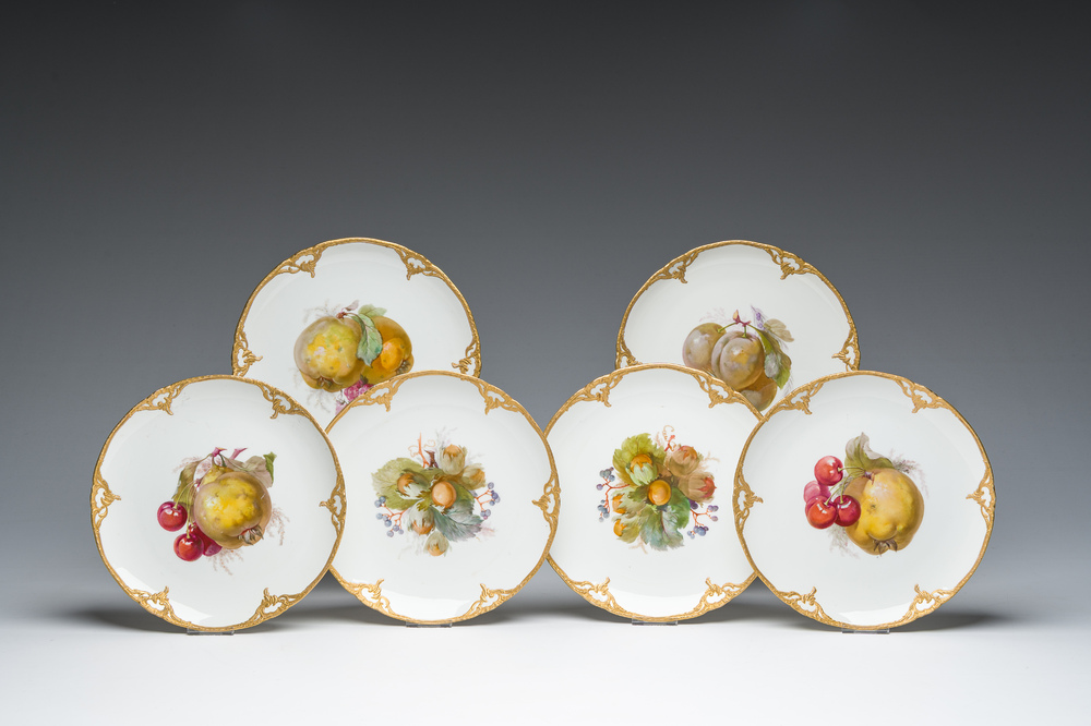 Six German gold layered and polychrome decorated porcelain 'fruit and nut' plates, KPM, Berlin, first quarter 20th C.