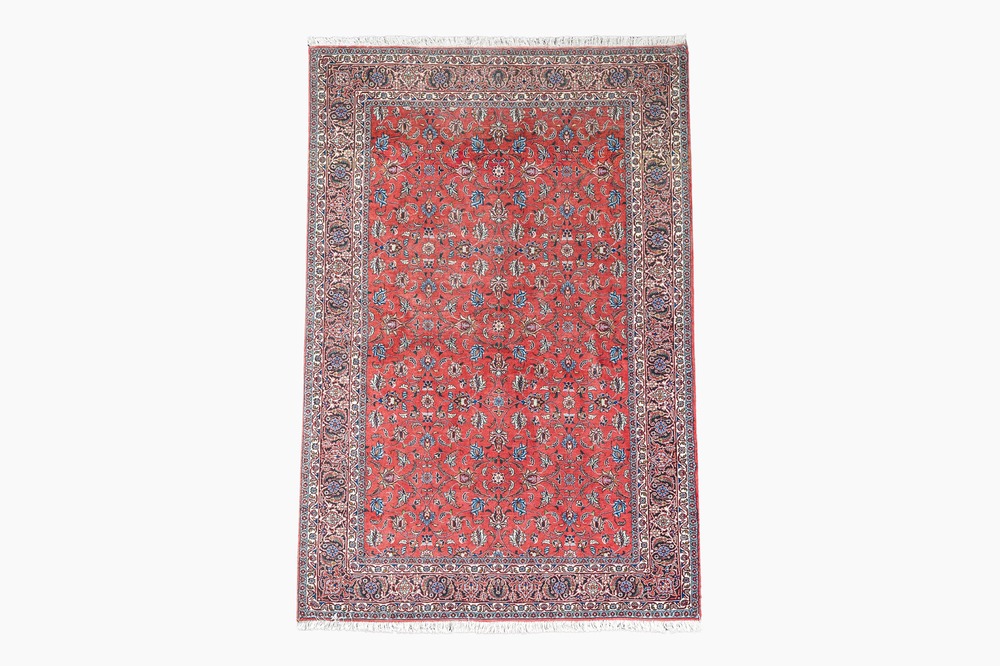 A Persian Tabriz rug with floral design, wool, cotton and silk, 20th C.