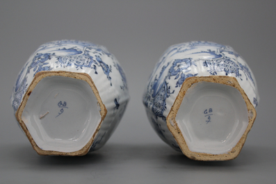 A pair of Dutch Delft blue and white vases, 18th C.