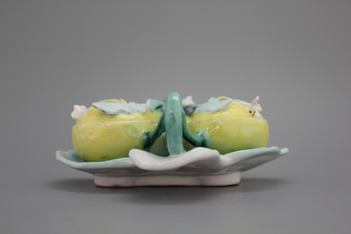 A pair of German faience tri-lobed spice boxes modelled as water lilies, 18th C.