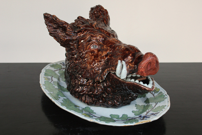 An impressive boar's head tureen on stand, Brussels faience, 18th C.