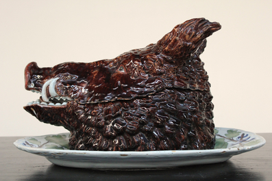 An impressive boar's head tureen on stand, Brussels faience, 18th C.
