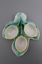A pair of German faience tri-lobed spice boxes modelled as water lilies, 18th C.