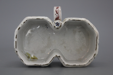 A Brussels faience "floral hedge" cruet stand, 18th C.