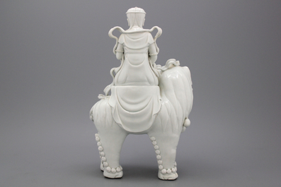 A fine blanc de chine Dehua figure of Manjusri, seated on a lion, early-mid 20th C.