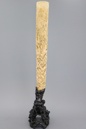 An important Chinese carved ivory tusk on stand, 19th C.