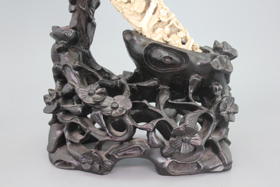 An important Chinese carved ivory tusk on stand, 19th C.