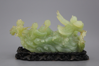 A Chinese carved jadeite group, Cultural Revolution, 20th C.