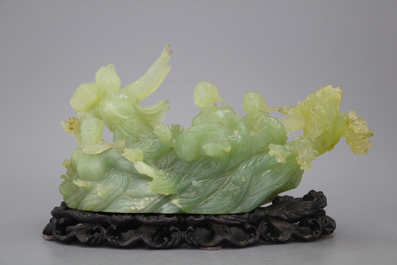 A Chinese carved jadeite group, Cultural Revolution, 20th C.