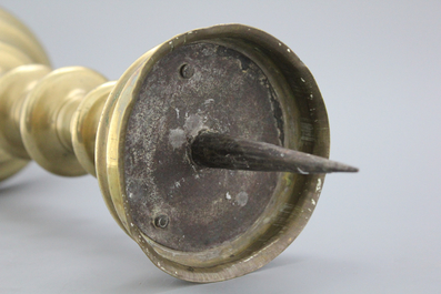 A large brass pricket candlestick, 16th C.