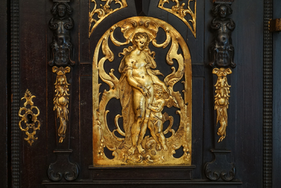 A South-German ebony veneer and gilded copper cabinet, 17th C.