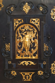 A South-German ebony veneer and gilded copper cabinet, 17th C.