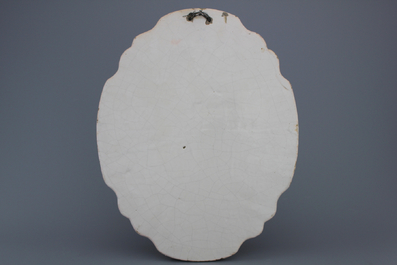 A Dutch Delft polychrome plaque, 19th C.