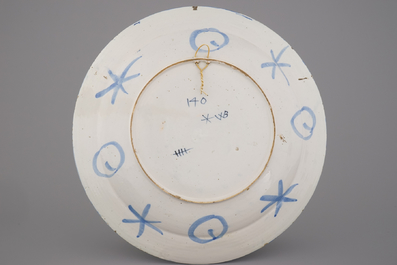 A very fine large Dutch Delft blue and white chinoiserie dish, late 17th C.