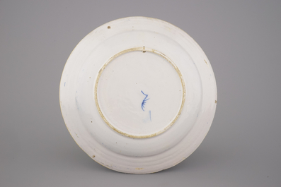 A Dutch Delft blue and white peacock's tail dish, 18th C.