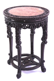 A Chinese carved wood and marble round vase stand