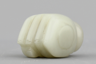 A celadon jade cane handle, 20th C.