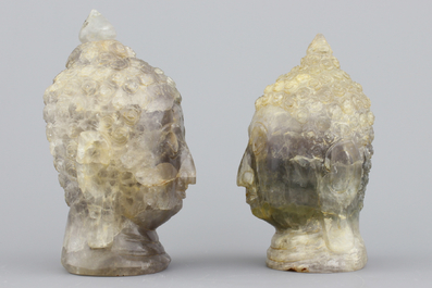 Paire de t&ecirc;tes de Bouddha sculpt&eacute;es en quartz, 20e