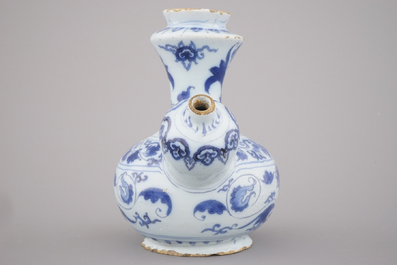 A Dutch Delft blue and white chinoiserie Kendi, late 17th C.