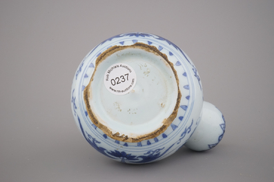 A Dutch Delft blue and white chinoiserie Kendi, late 17th C.