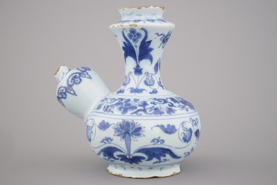 A Dutch Delft blue and white chinoiserie Kendi, late 17th C.