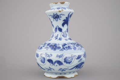 A Dutch Delft blue and white chinoiserie Kendi, late 17th C.