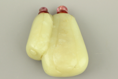 A Chinese celadon jade twin snuff bottle