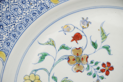 A large Chinese porcelain doucai dish, Kangxi or Yongzheng