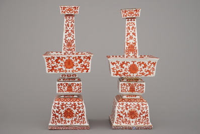 A pair of Chinese porcelain coral red decorated altar candlesticks, 19th C.