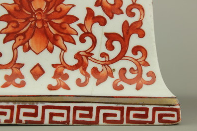 A pair of Chinese porcelain coral red decorated altar candlesticks, 19th C.