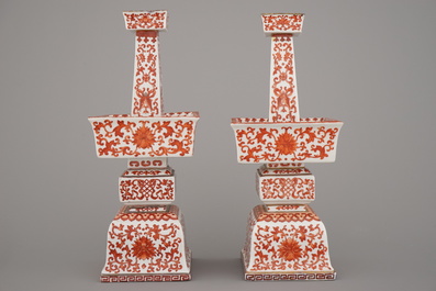 A pair of Chinese porcelain coral red decorated altar candlesticks, 19th C.
