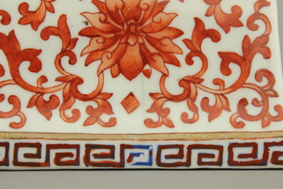 A pair of Chinese porcelain coral red decorated altar candlesticks, 19th C.