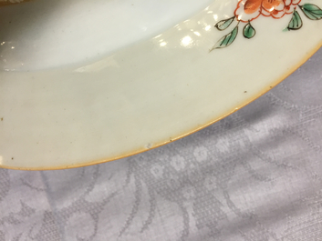 A Chinese armorial porcelain plate with a parrot, Yongzheng, ca. 1725