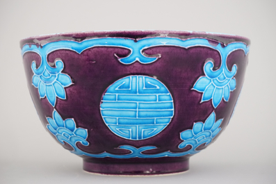 A Chinese porcelain fahua relief-decorated bowl, 19th C.
