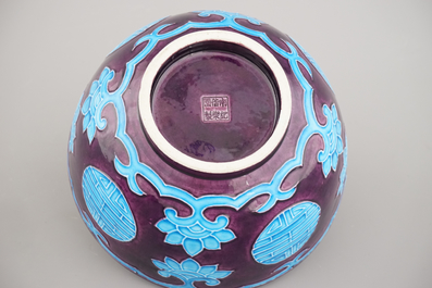 A Chinese porcelain fahua relief-decorated bowl, 19th C.