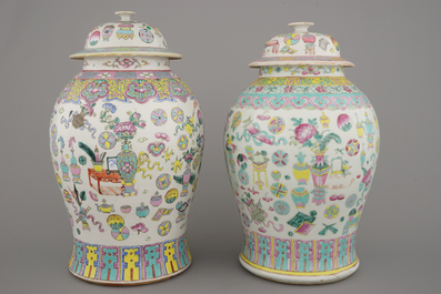 Two Chinese porcelain famille rose jars and covers with scholar's objects, 19th C.