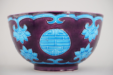 A Chinese porcelain fahua relief-decorated bowl, 19th C.
