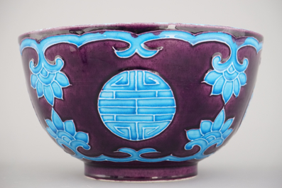 A Chinese porcelain fahua relief-decorated bowl, 19th C.