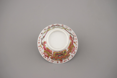 A Chinese porcelain famille rose armorial cup and saucer with VOC coat of arms, dated 1728, Yongzheng