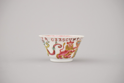 A Chinese porcelain famille rose armorial cup and saucer with VOC coat of arms, dated 1728, Yongzheng