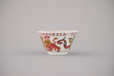 A Chinese porcelain famille rose armorial cup and saucer with VOC coat of arms, dated 1728, Yongzheng